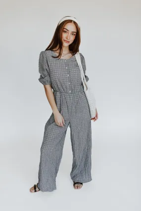 The Prowell Gingham Woven Jumpsuit in Black Multi